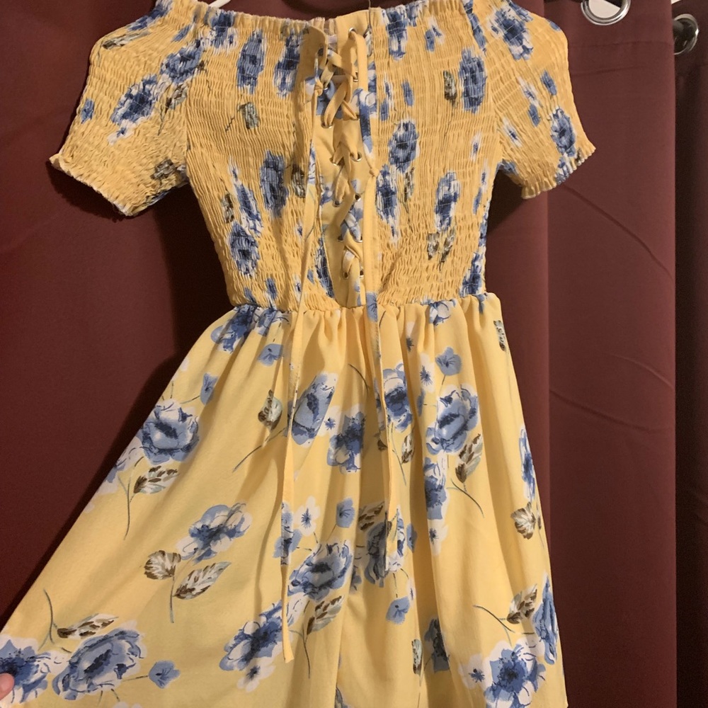 A floral romper. - Picture 1 of 3